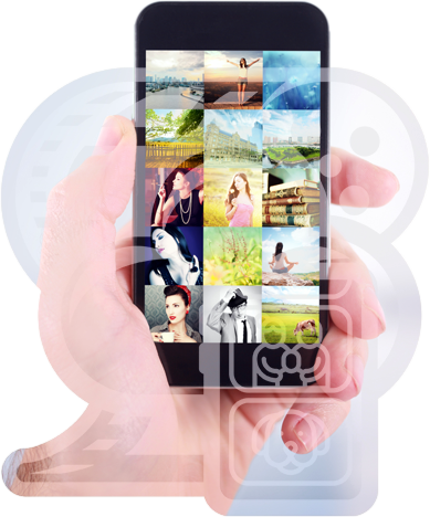 A phone held in one hand showing a grid of digitised family photographs