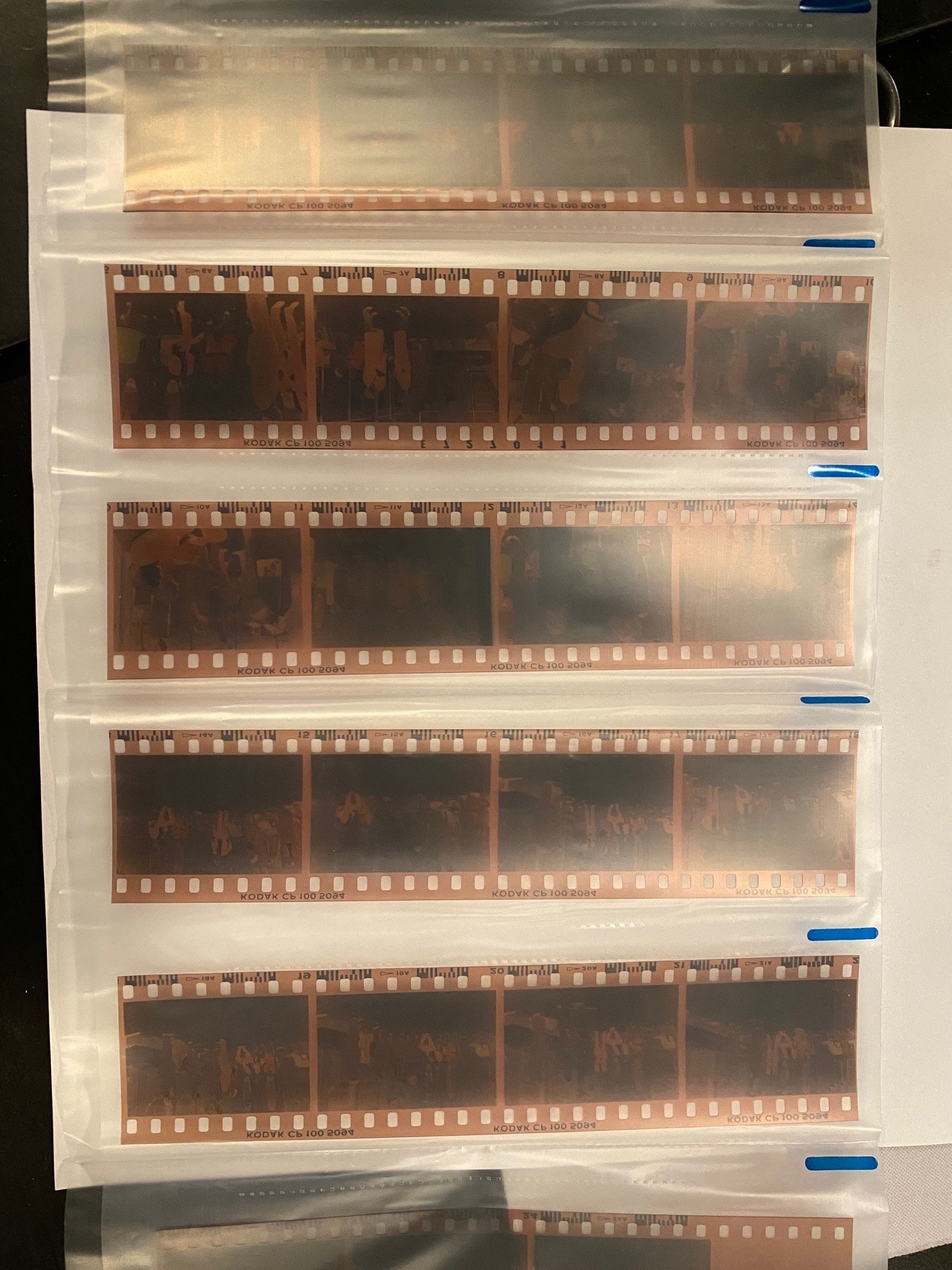 35mm photo negatives and mounted slides laid out for scanning