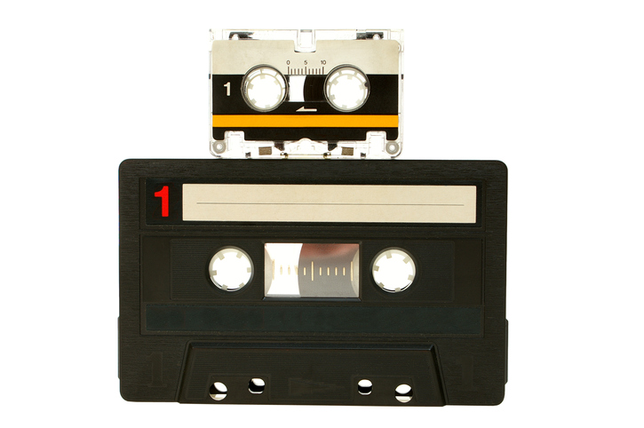 A VHS tape with its magnetic ribbon exposed